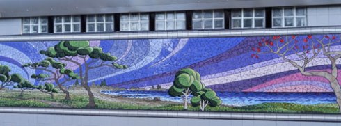 Mosaic on one of the buildings in the park