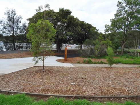 New trees & mulched areas at the entrance on the western side of Tempe Reserve